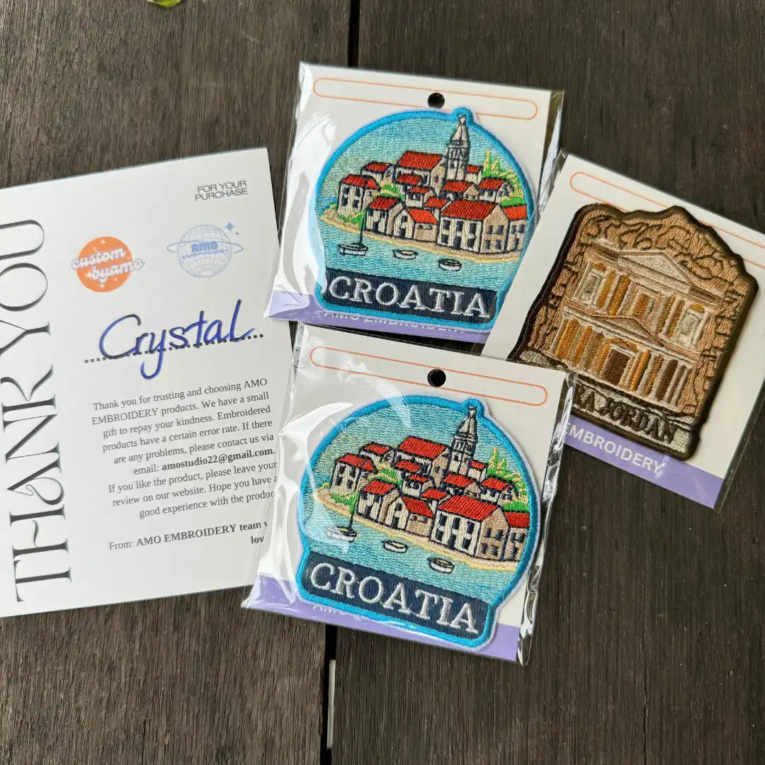 Close-up of iron-on Petra souvenir patch for travel lovers