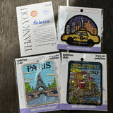 Close-up of yellow cab travel souvenir patch for jackets and bags