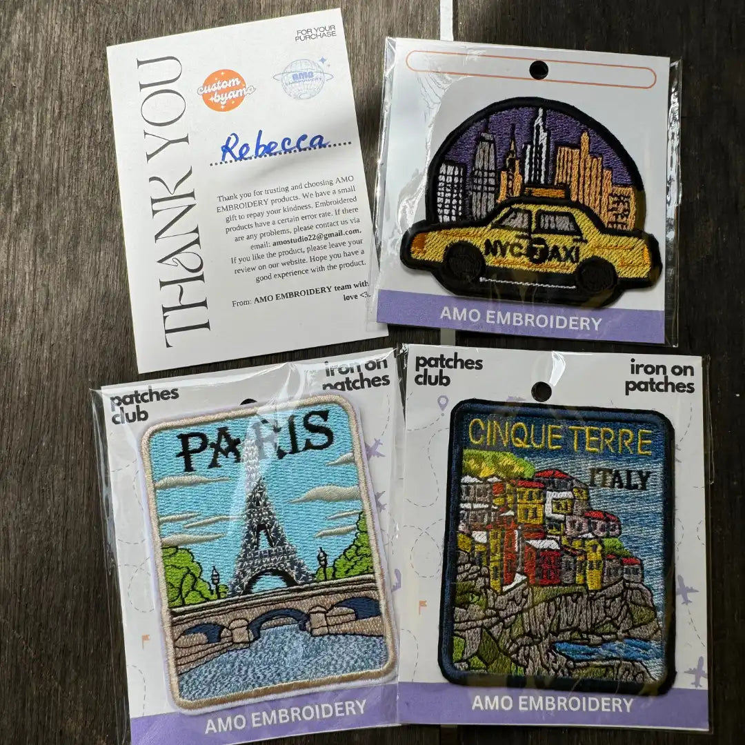 Close-up of yellow cab travel souvenir patch for jackets and bags