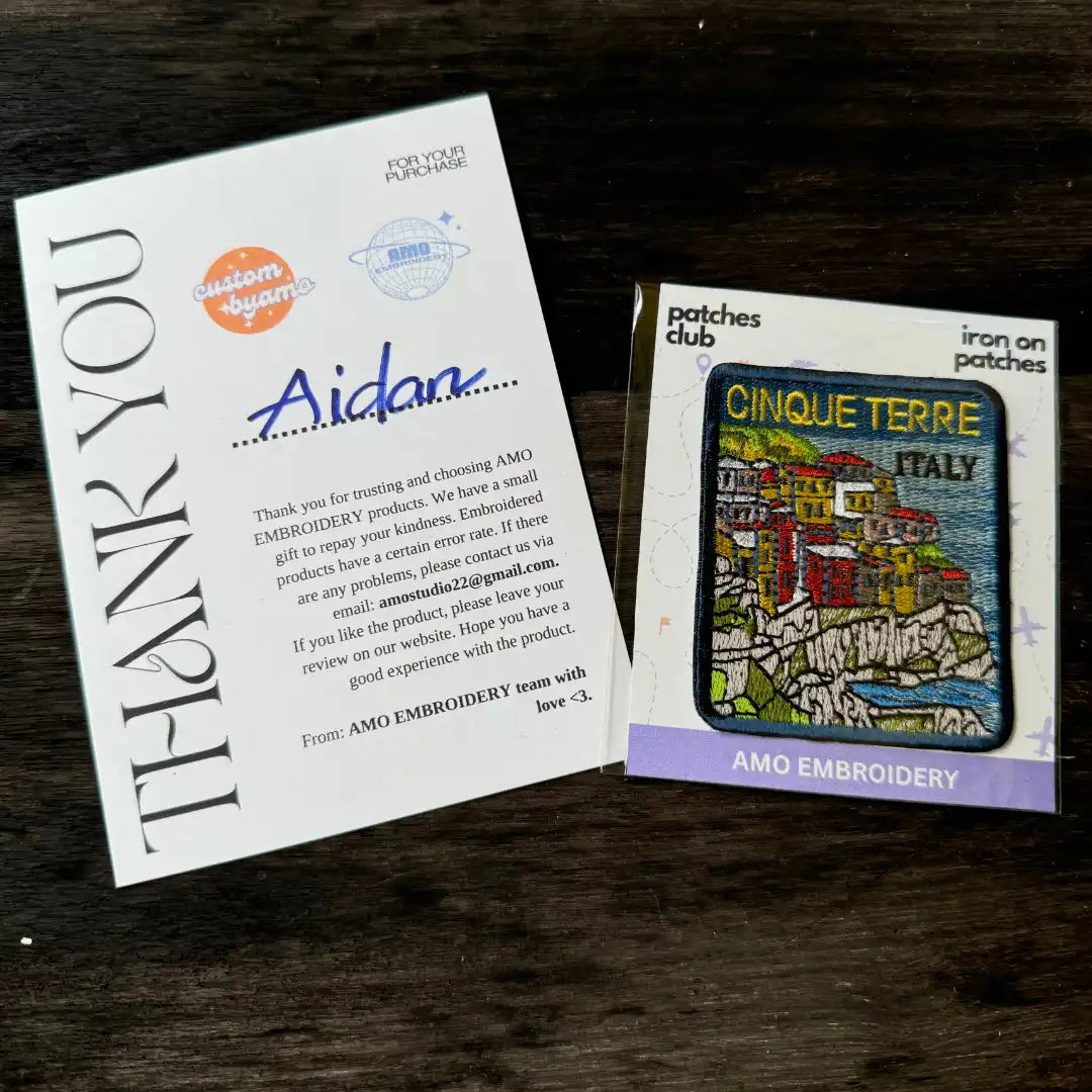 Colorful embroidery of houses on cliffs above Mediterranean Sea