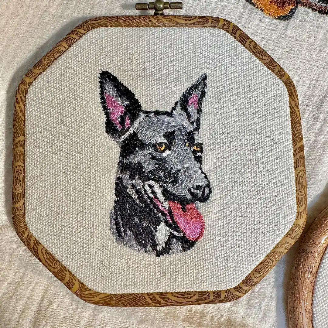 Cat face thread art framed in round hoop
