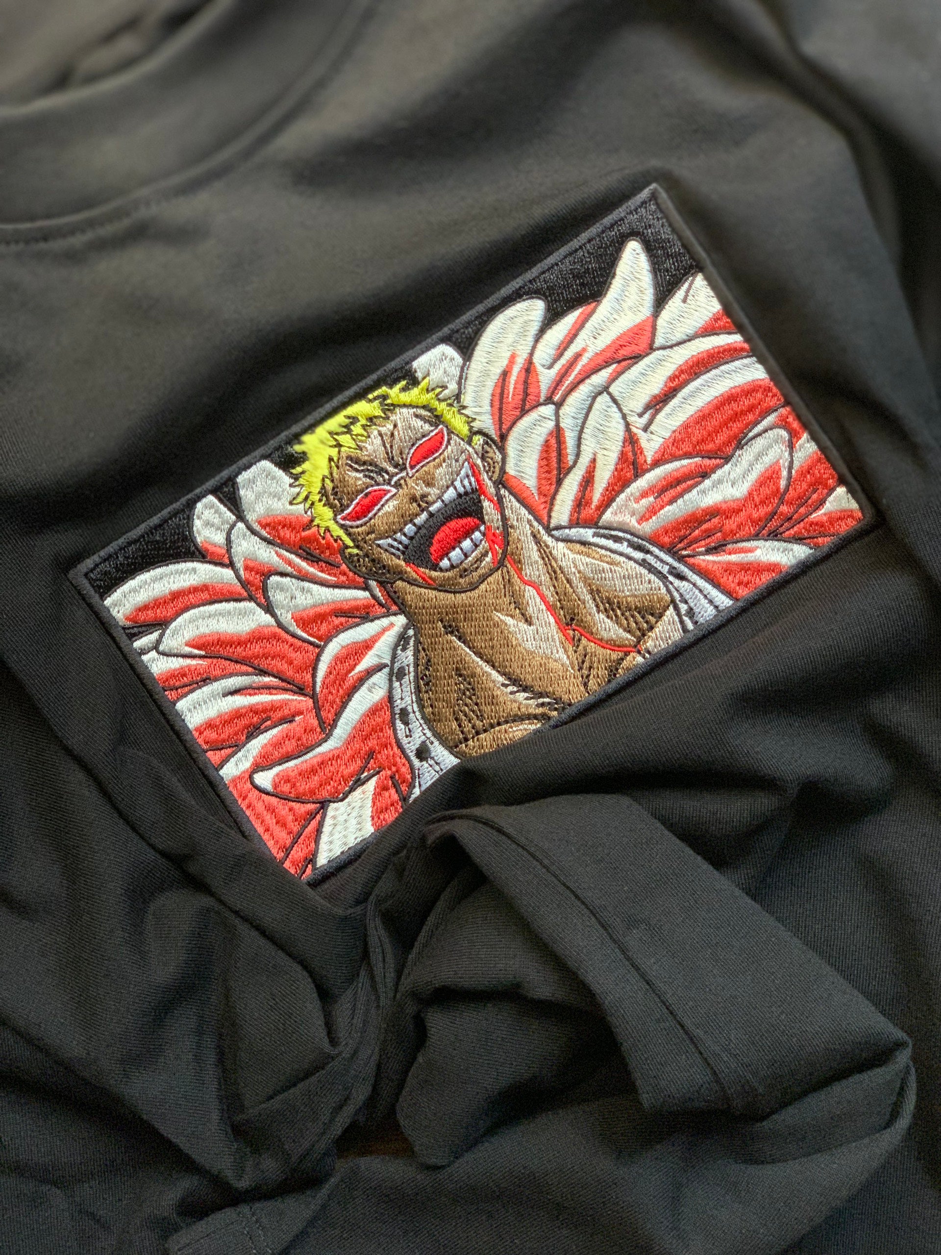 Donquixote Doflamingo character stitched on black cotton tee