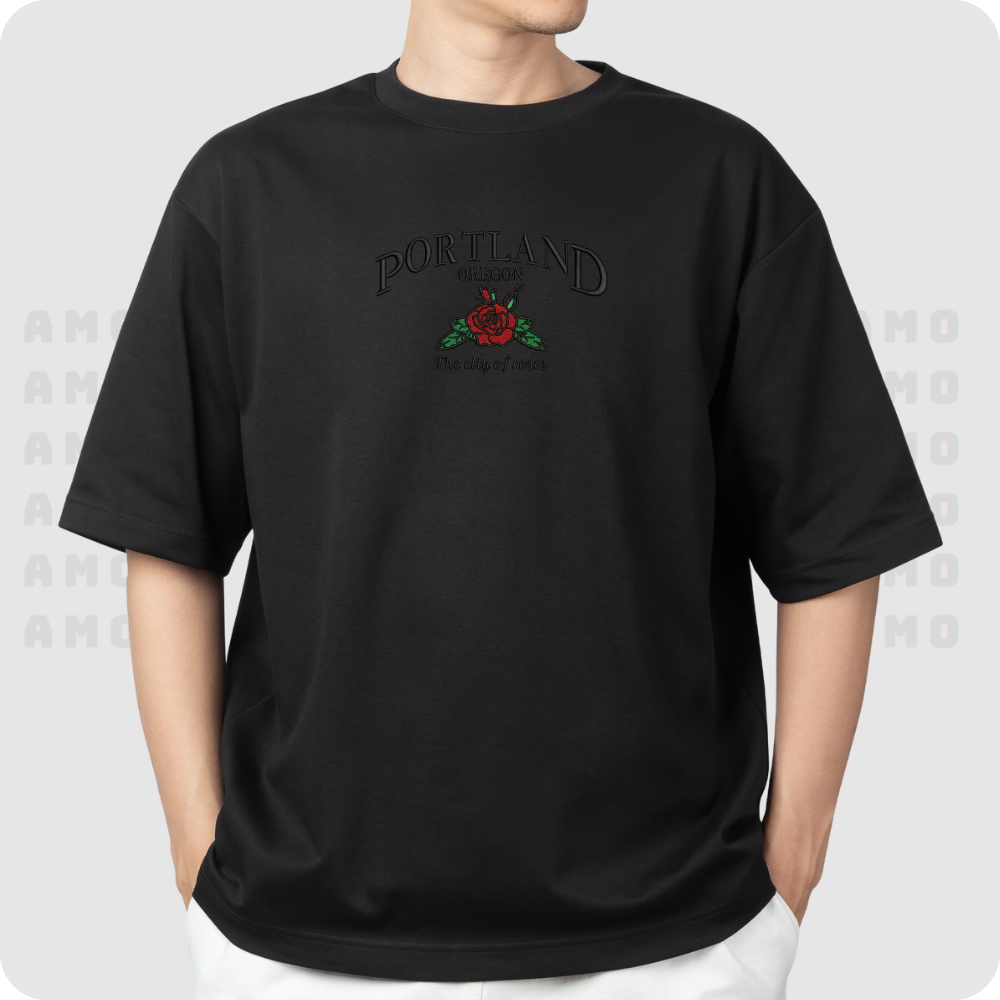 Folded Oregon city tee with embroidery showing