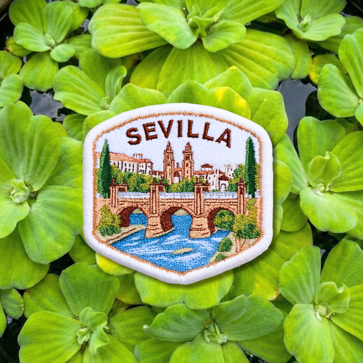 Sevilla Spain embroidery patch featuring historic bridge and cathedral skyline