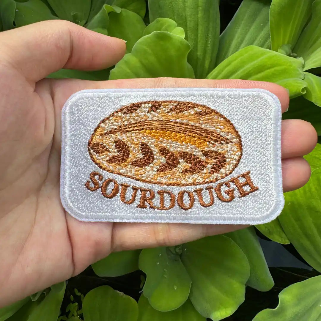 Rustic bread patch with red stitched border