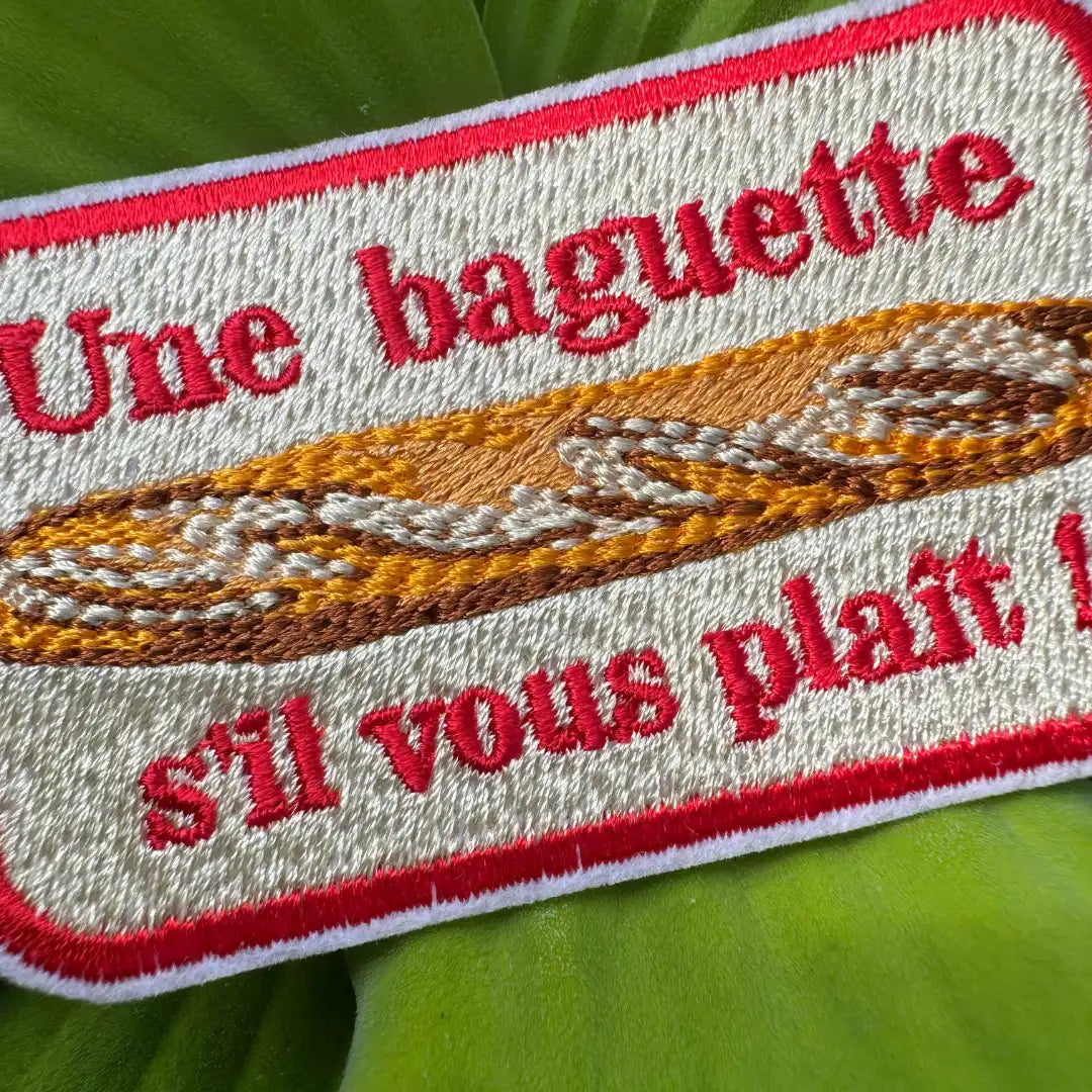 Cute baguette patch with red border and text