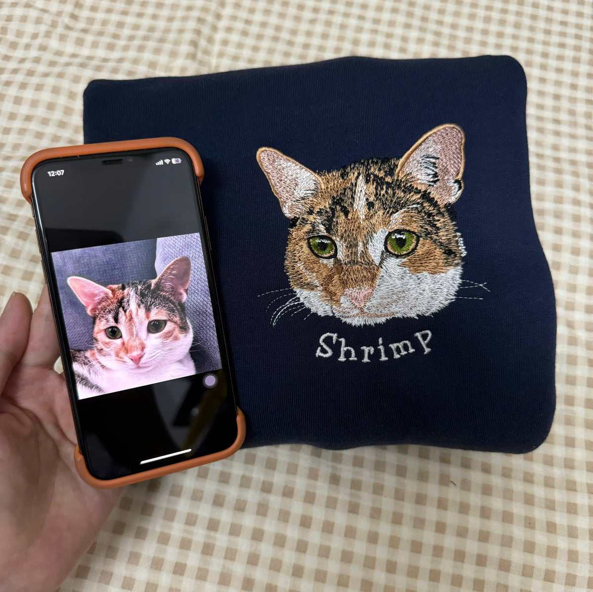 Custom embroidered pet portrait sweatshirt made from a customer's photo
