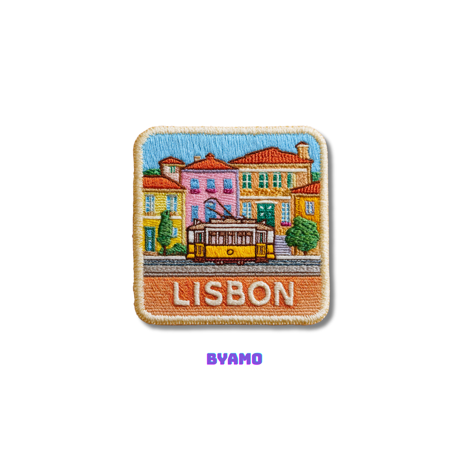 Embroidered patch of Lisbon with colorful buildings and a tram, featuring the word 'Lisbon' and the brand 'BYAMO'.