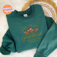 Mrs. Clause's Gingerbread Bakery Embroidered Sweater/Hoodie