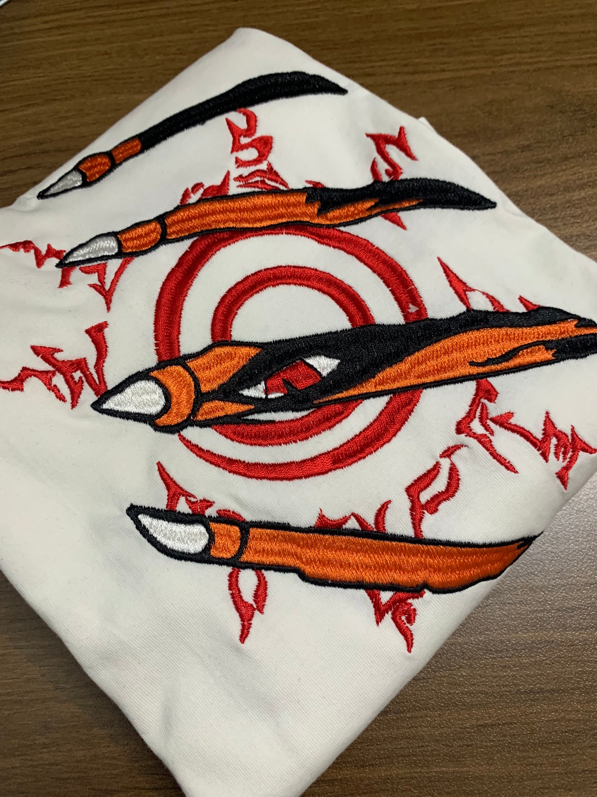 Anime-inspired embroidery on soft unisex sweatshirt