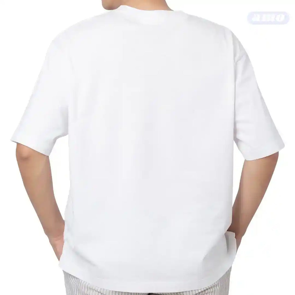 White t-shirt worn by a person on a white background