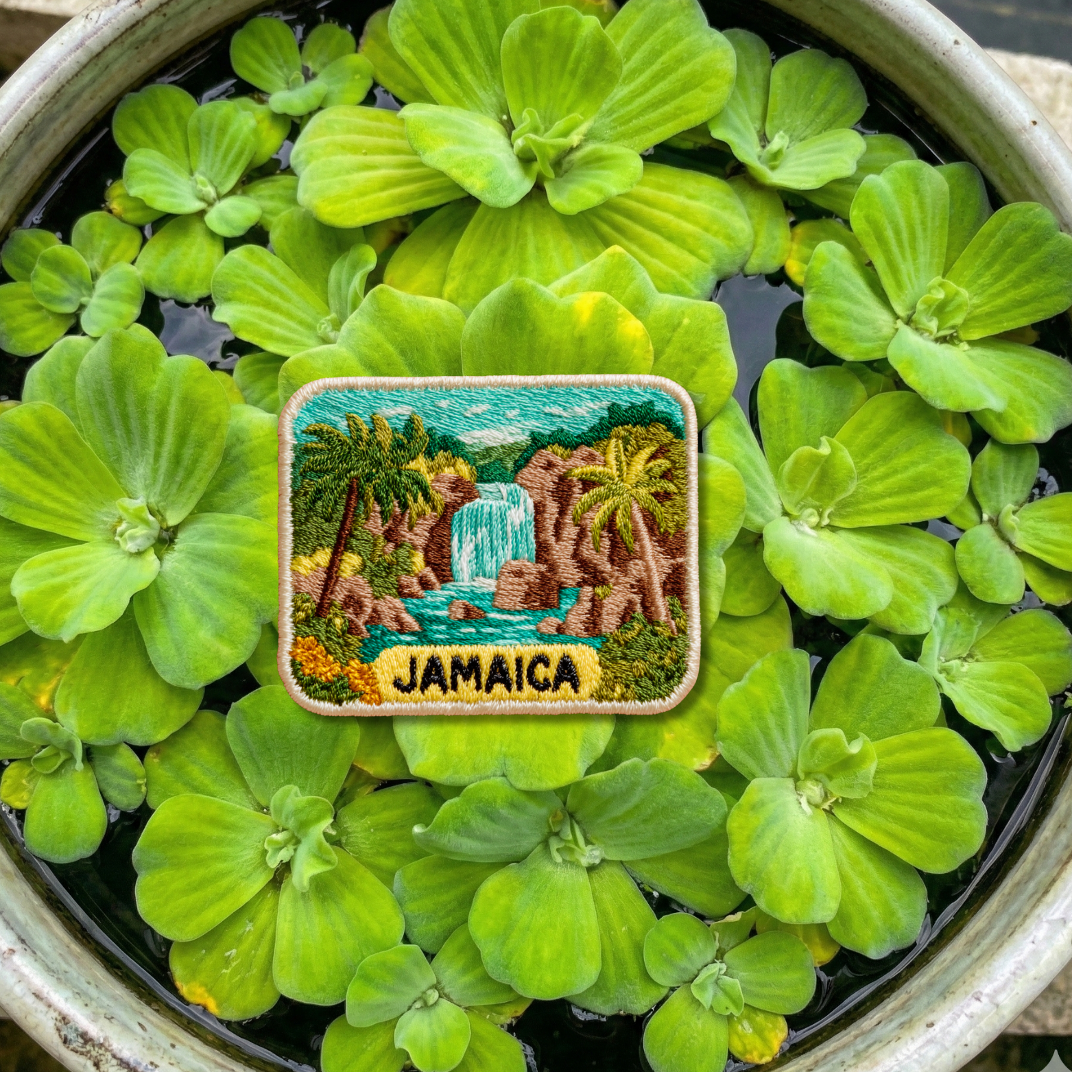 Close-up detail of high-quality stitching on Jamaica tropical embroidery patch
