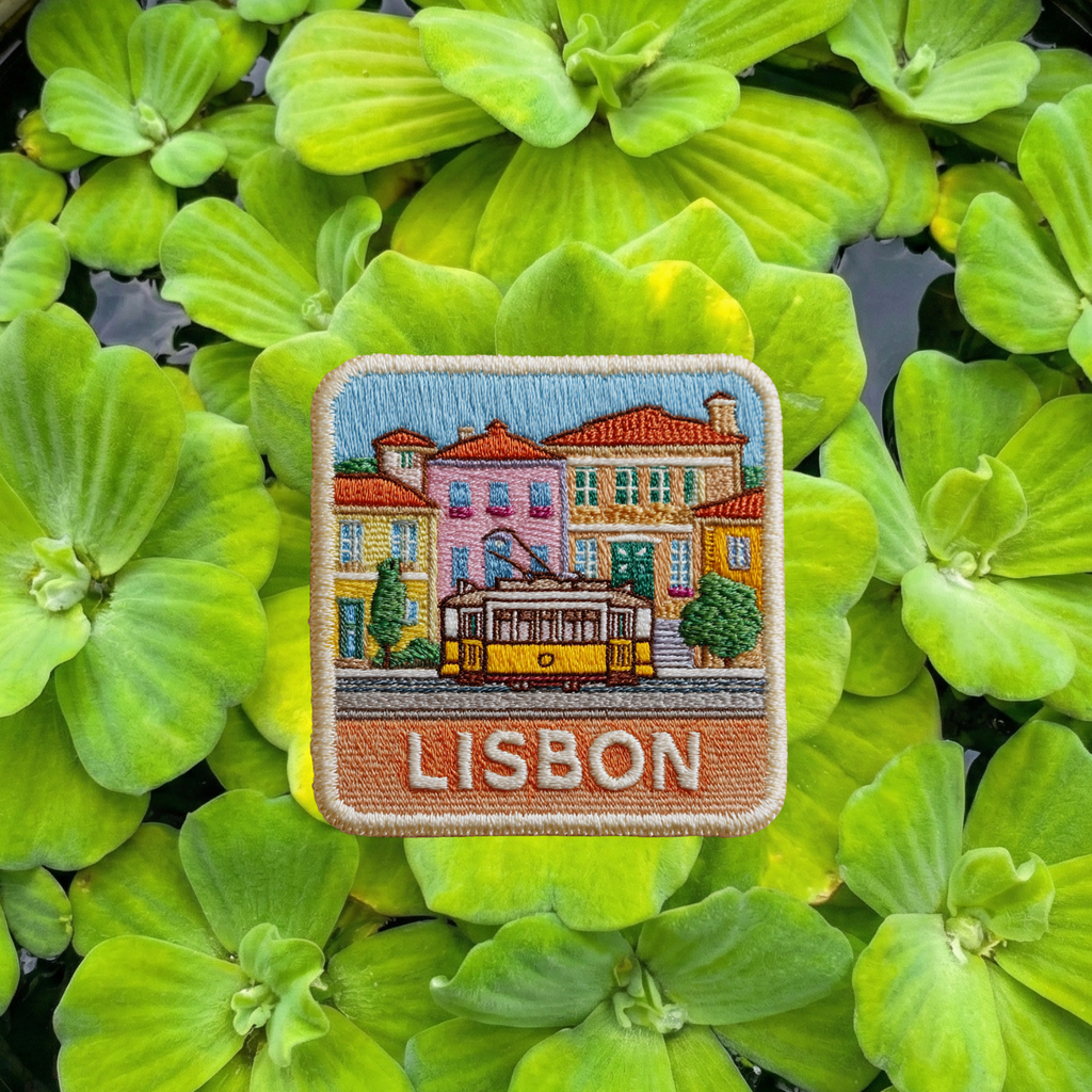 Close-up embroidery detail of Lisbon Portugal travel patch

