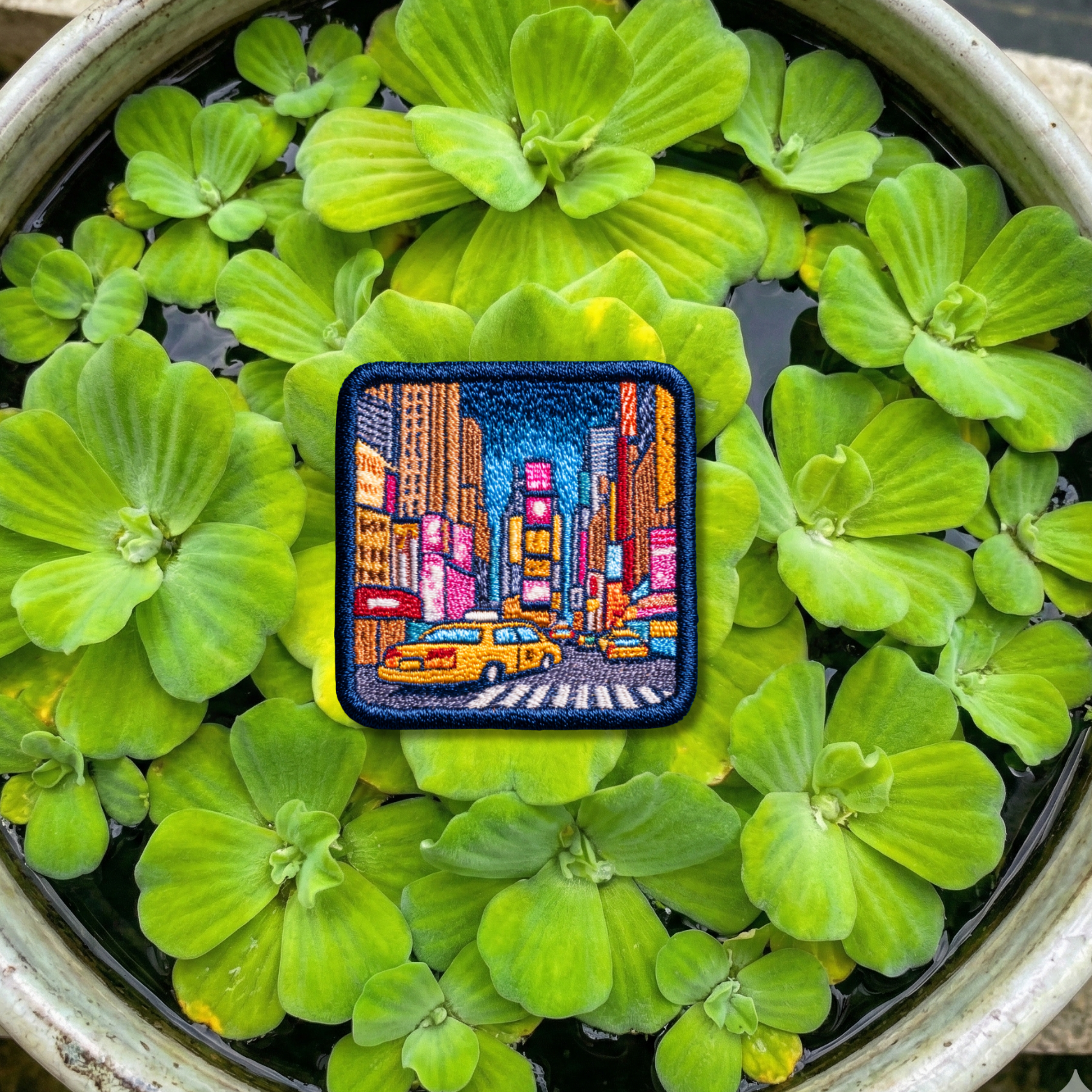 Close-up embroidery detail of New York City travel patch
