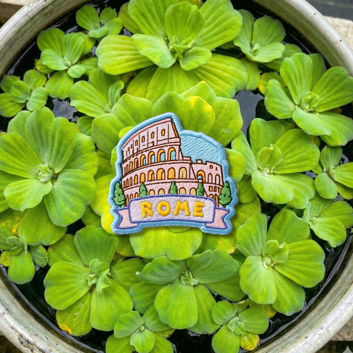 Close-up embroidery details of Rome Colosseum travel patch
