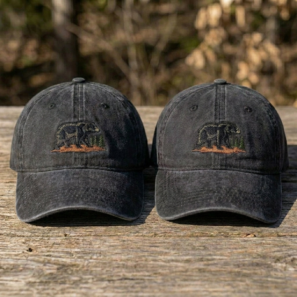 Close-up of detailed black bear embroidery on cotton cap