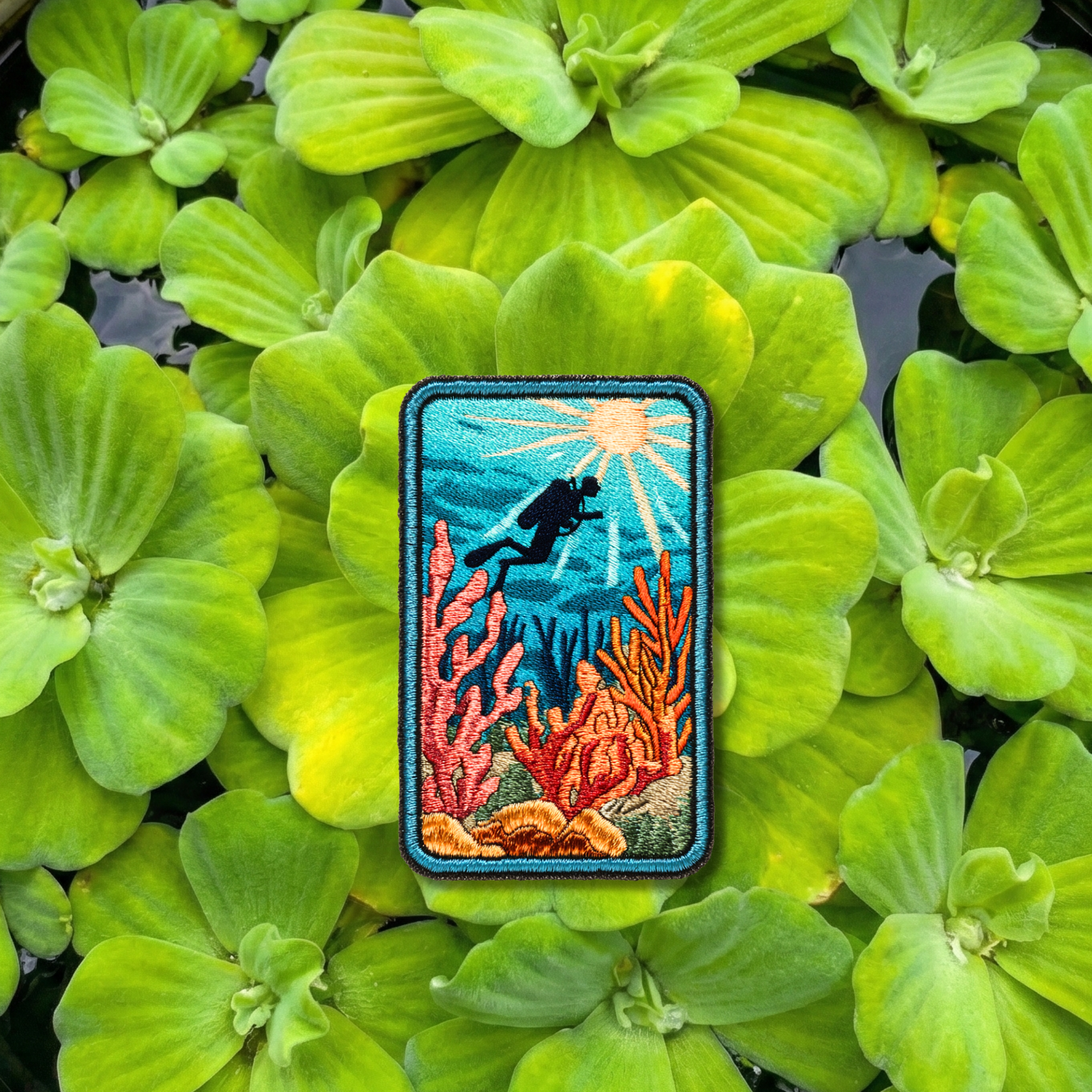 Cozumel scuba diving embroidery patch featuring diver and coral reef