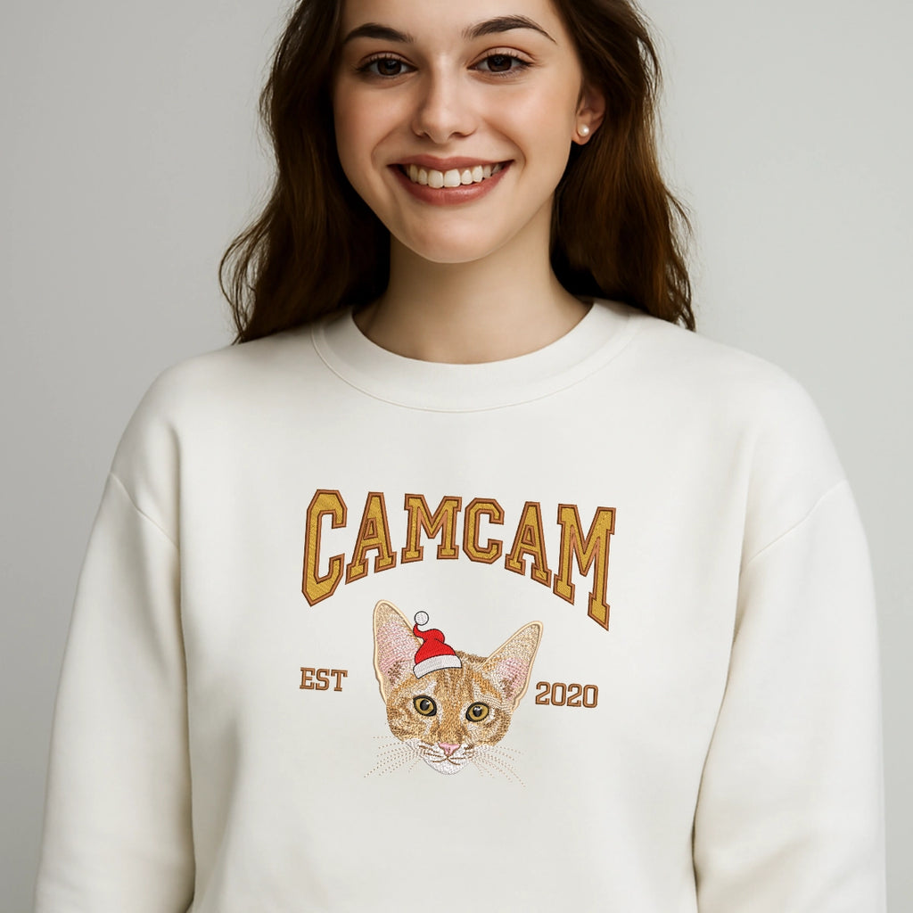 Custom pet face embroidery on cream crewneck