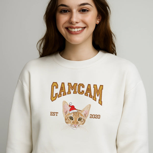 Custom pet face embroidery on cream crewneck