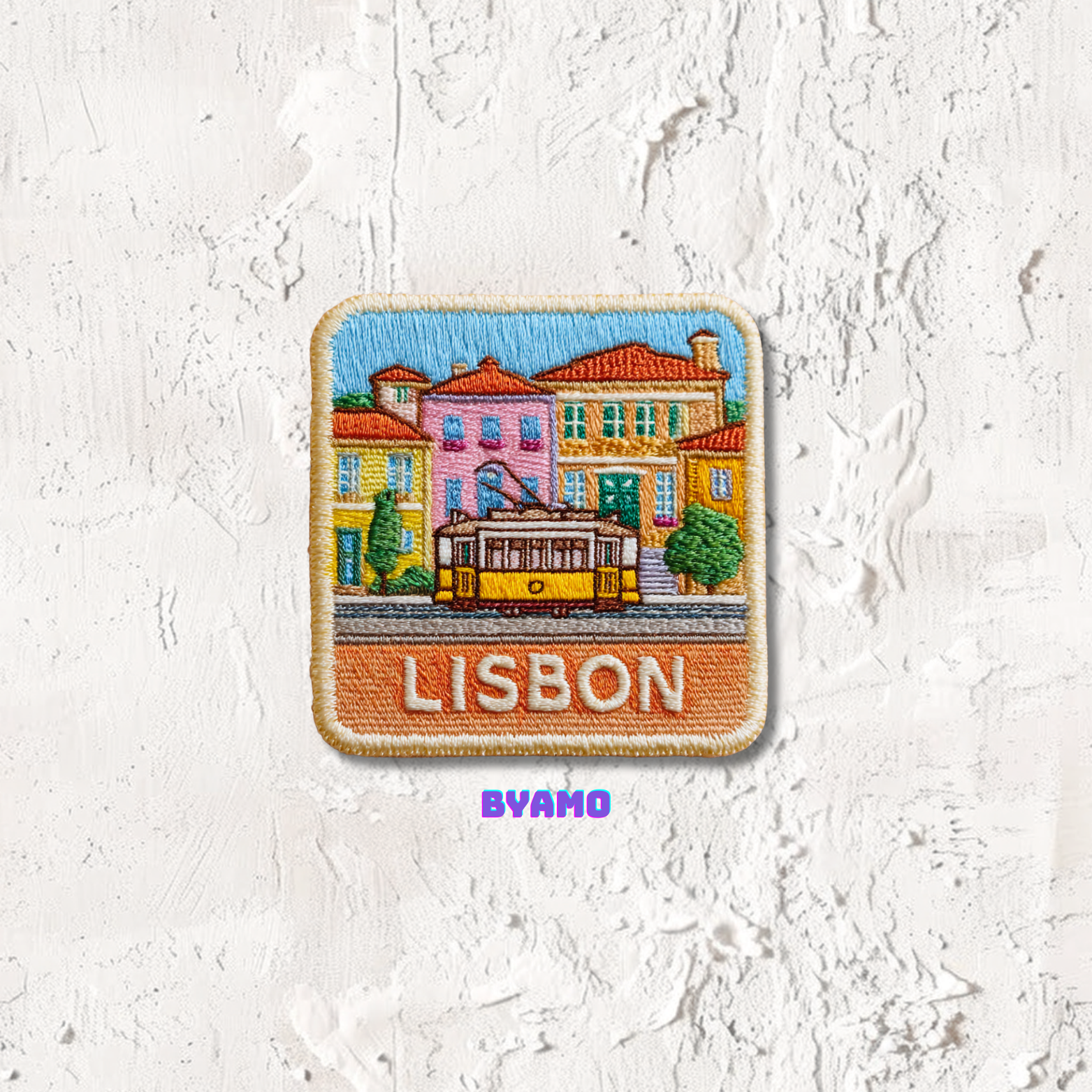 Lisbon Portugal travel embroidery patch with iconic yellow tram and colorful historic buildings
