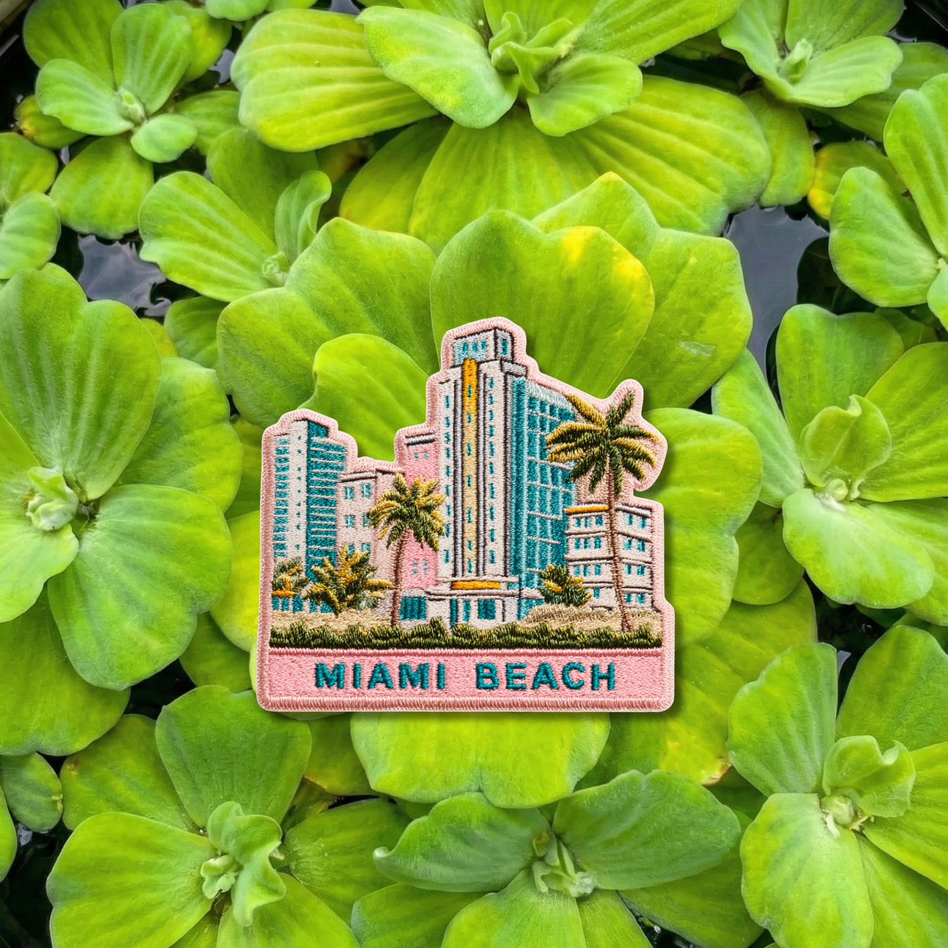 Miami Beach embroidery patch featuring Art Deco buildings and palm trees