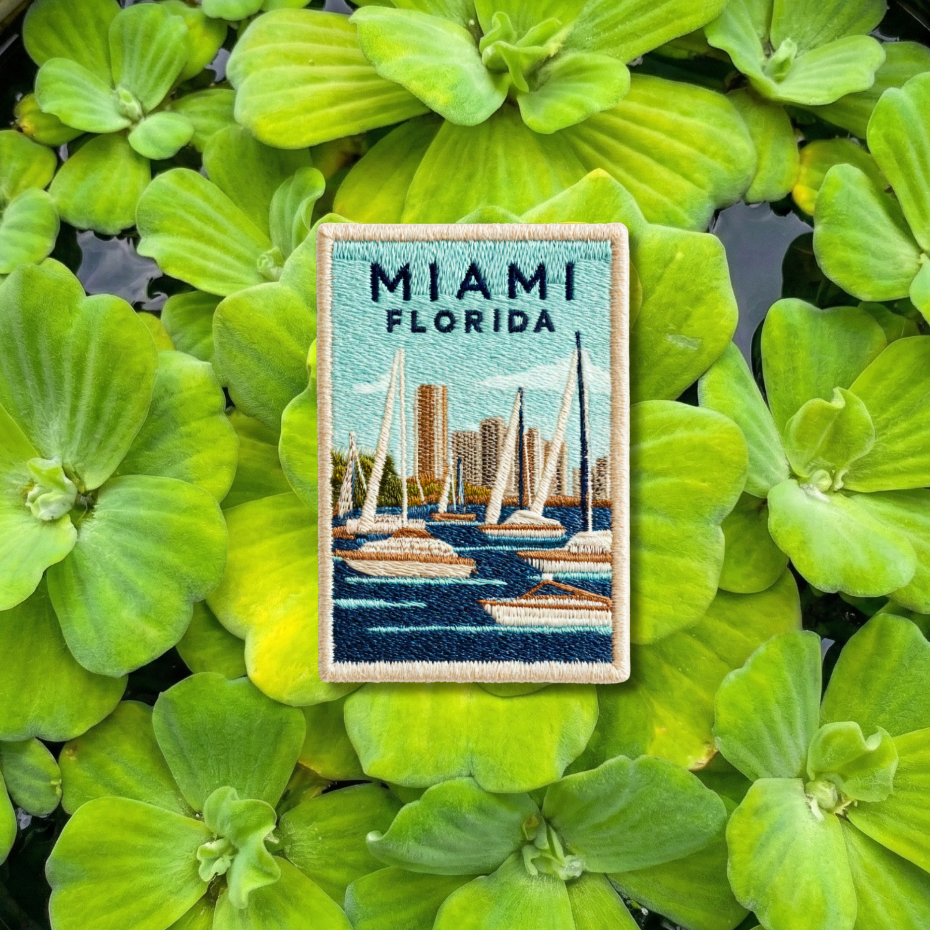 Miami Florida embroidery patch featuring marina sailboats and skyline