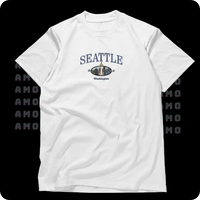 Model wearing Seattle embroidered shirt with jeans