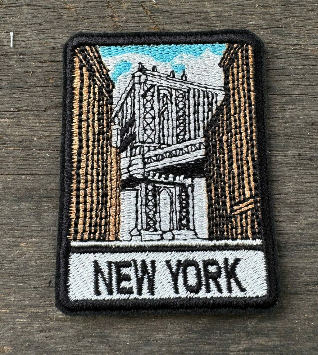 New York embroidery patch featuring suspension bridge and city buildings