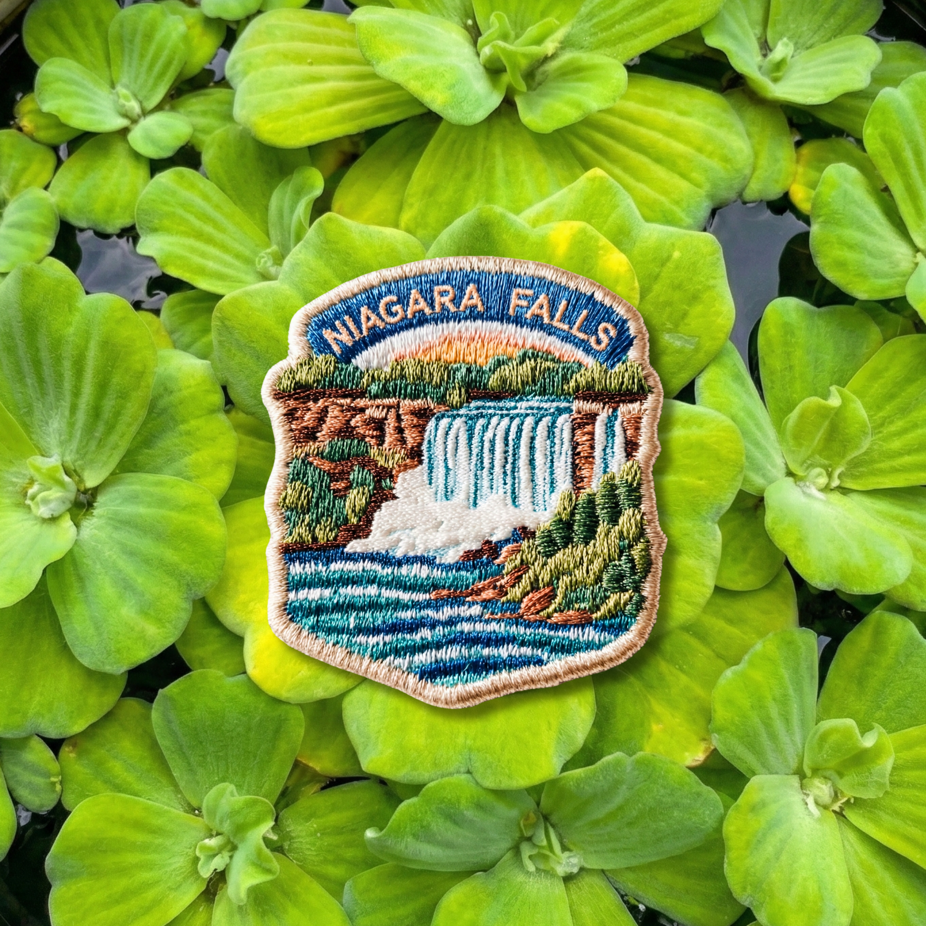 Niagara Falls embroidery patch featuring waterfall and river landscape