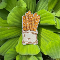 Baguette bundle embroidered patch close-up