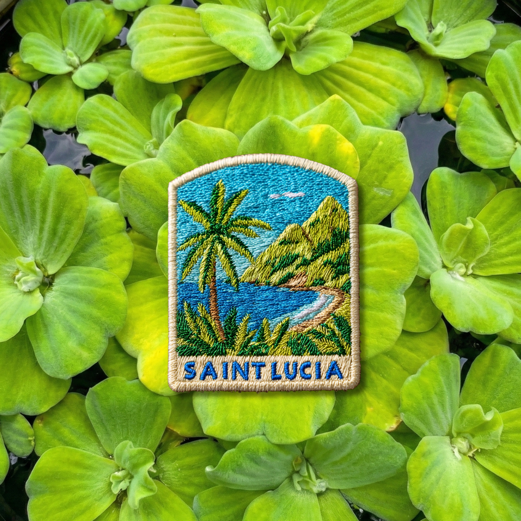 Saint Lucia embroidery patch featuring tropical coastline, palm trees, and mountains
