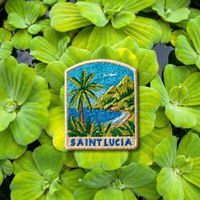 Saint Lucia embroidery patch featuring tropical coastline, palm trees, and mountains
