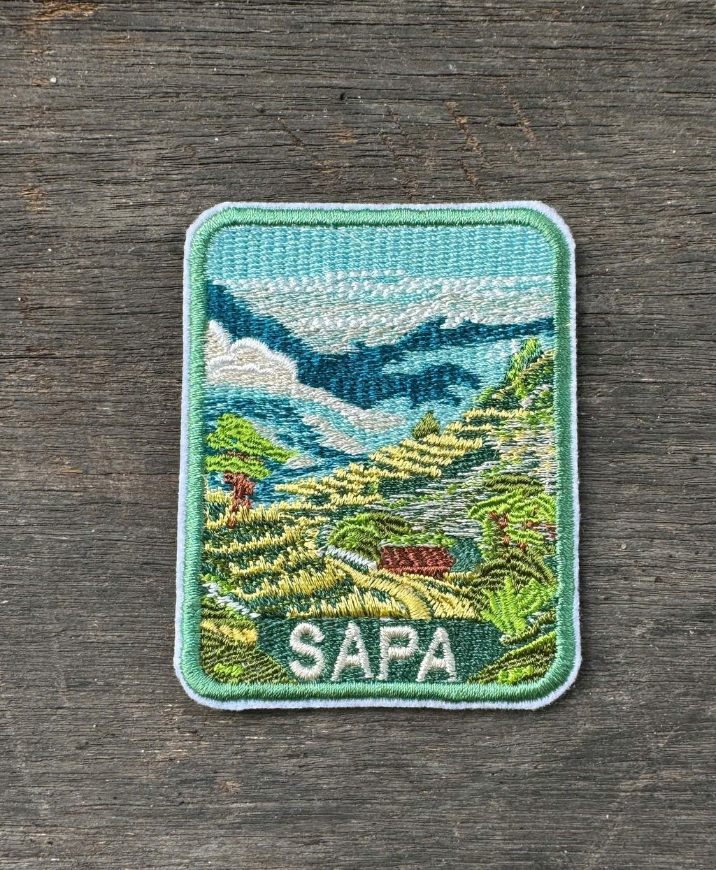 Sapa Vietnam embroidery patch featuring mountain rice terraces landscape