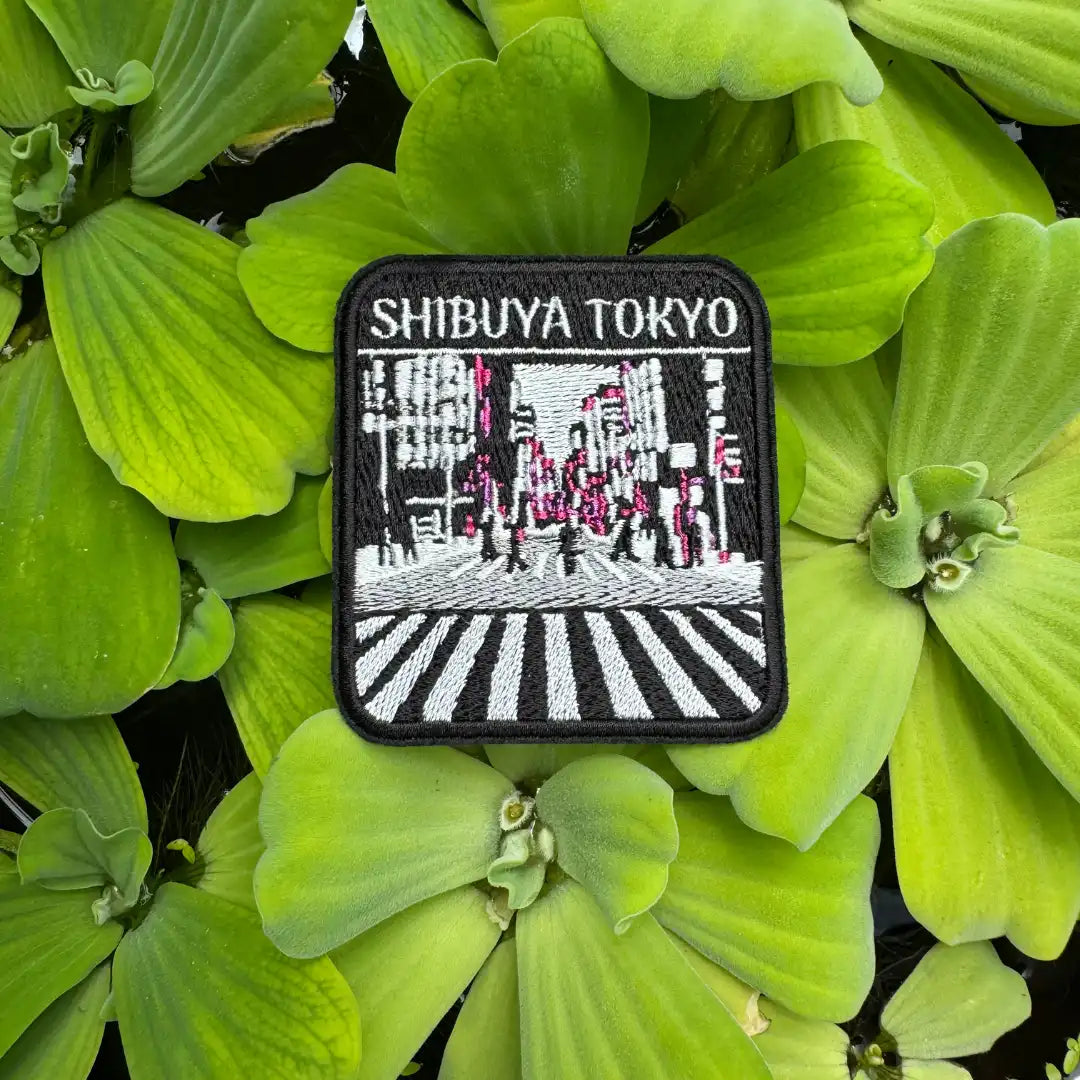 Shibuya Tokyo patch featuring famous crosswalk scene in black, white, and pink