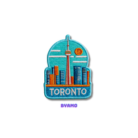 Toronto embroidered travel patch attached to backpack as Canadian city souvenir
