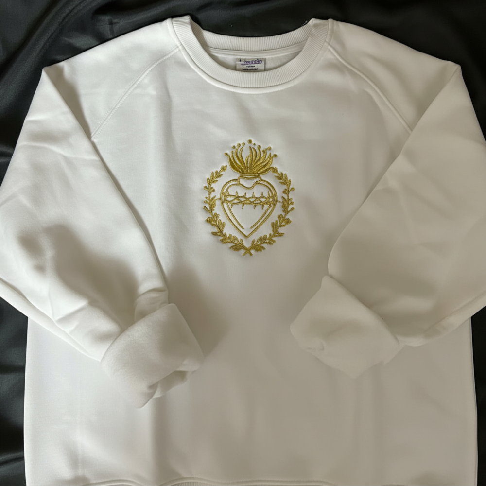 catholic sacred heart embroidered sweater close up