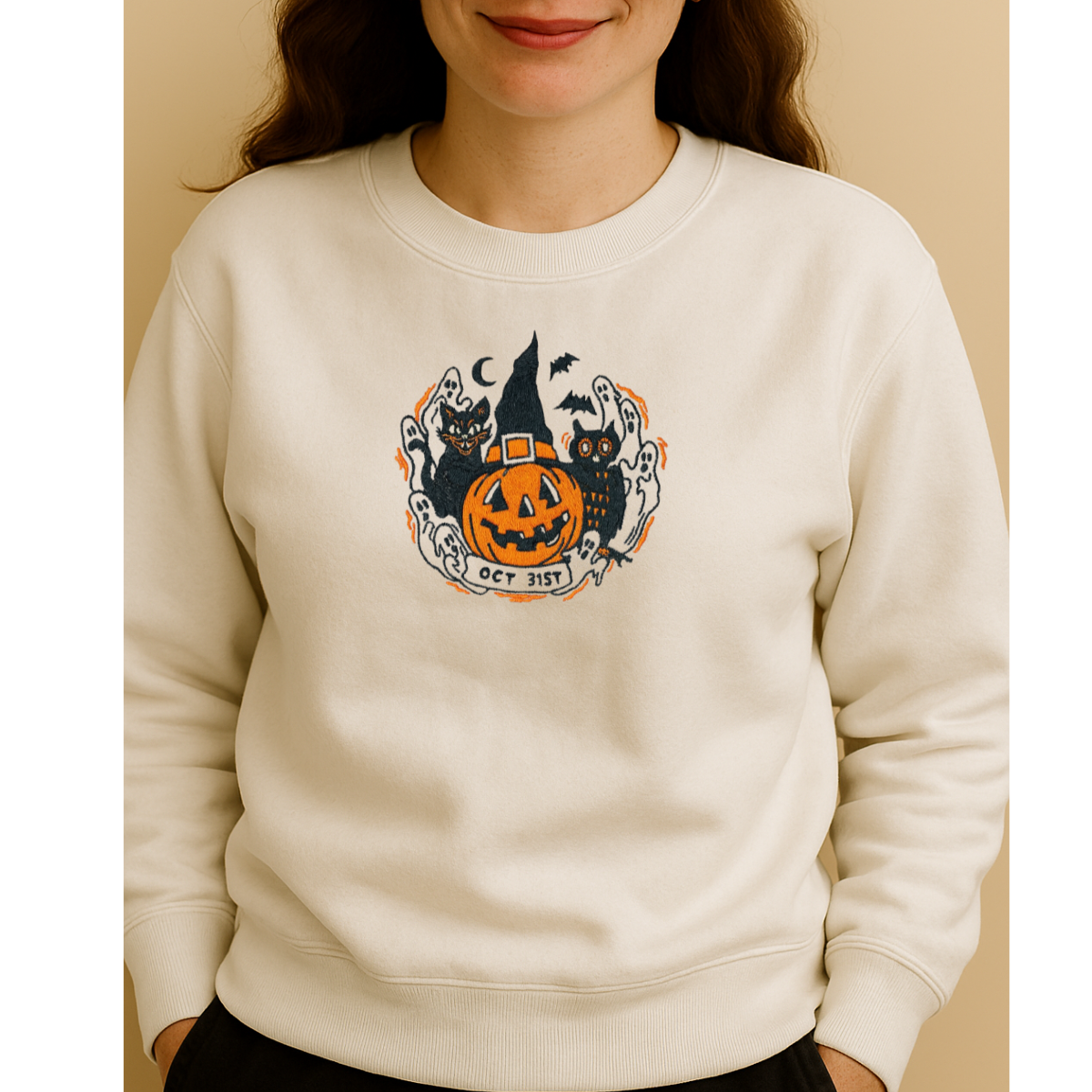 close-up embroidery pumpkin, black cats, ghosts and bats design