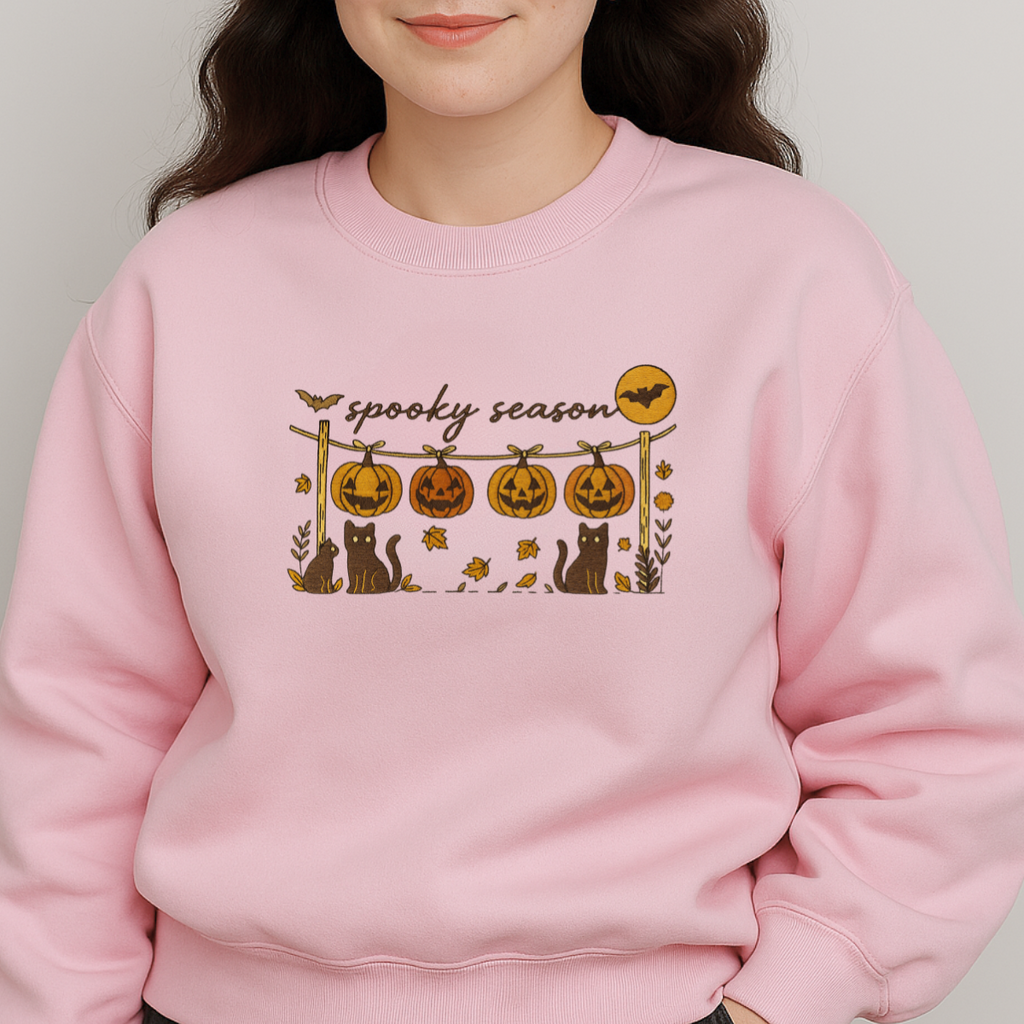 close-up embroidery pumpkins cats and bats design