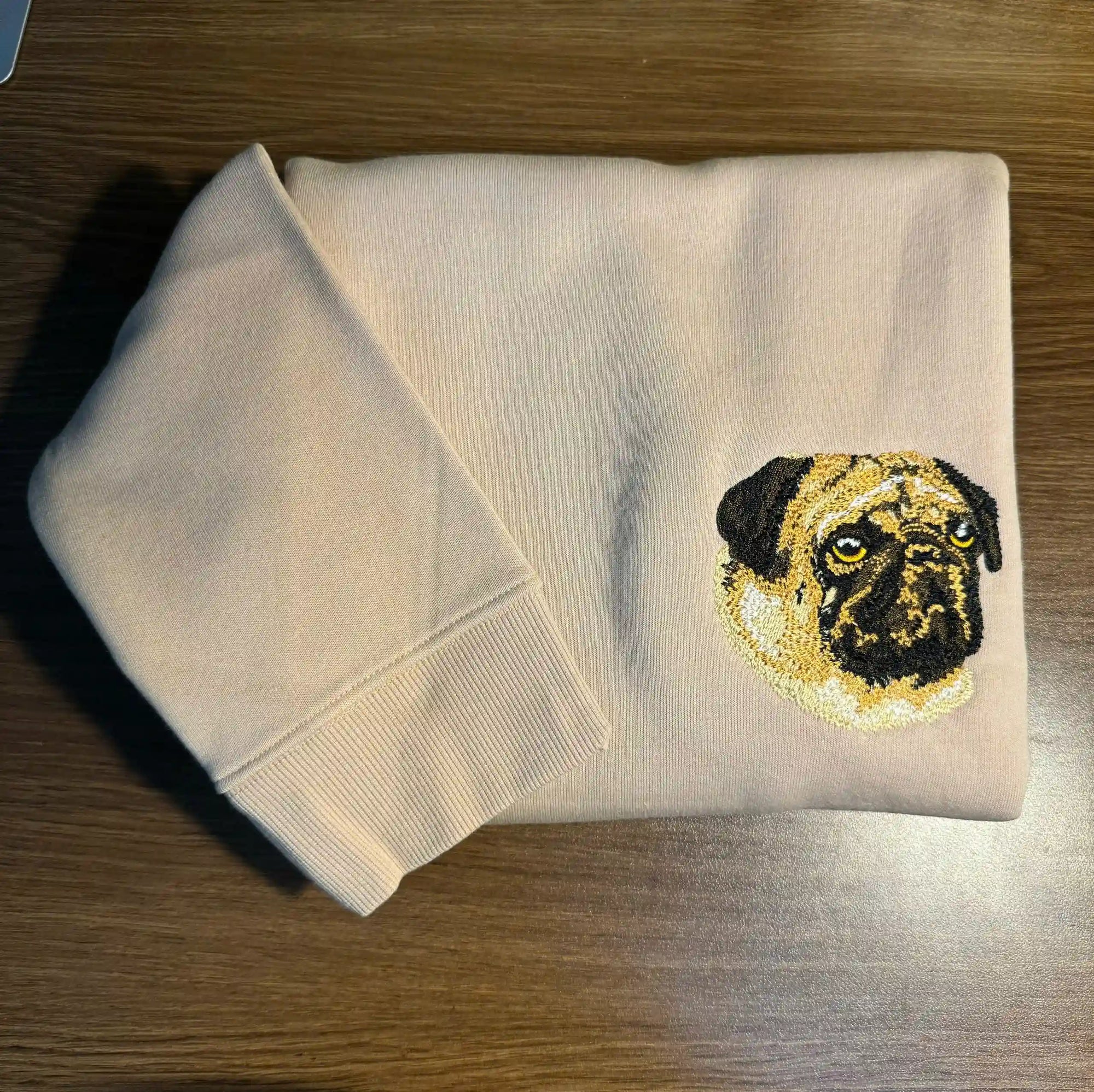 detailed pug dog embroidery on sweatshirt