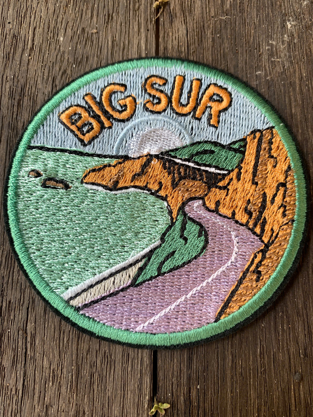 iron-on big sur embroidered patch on denim jacket
