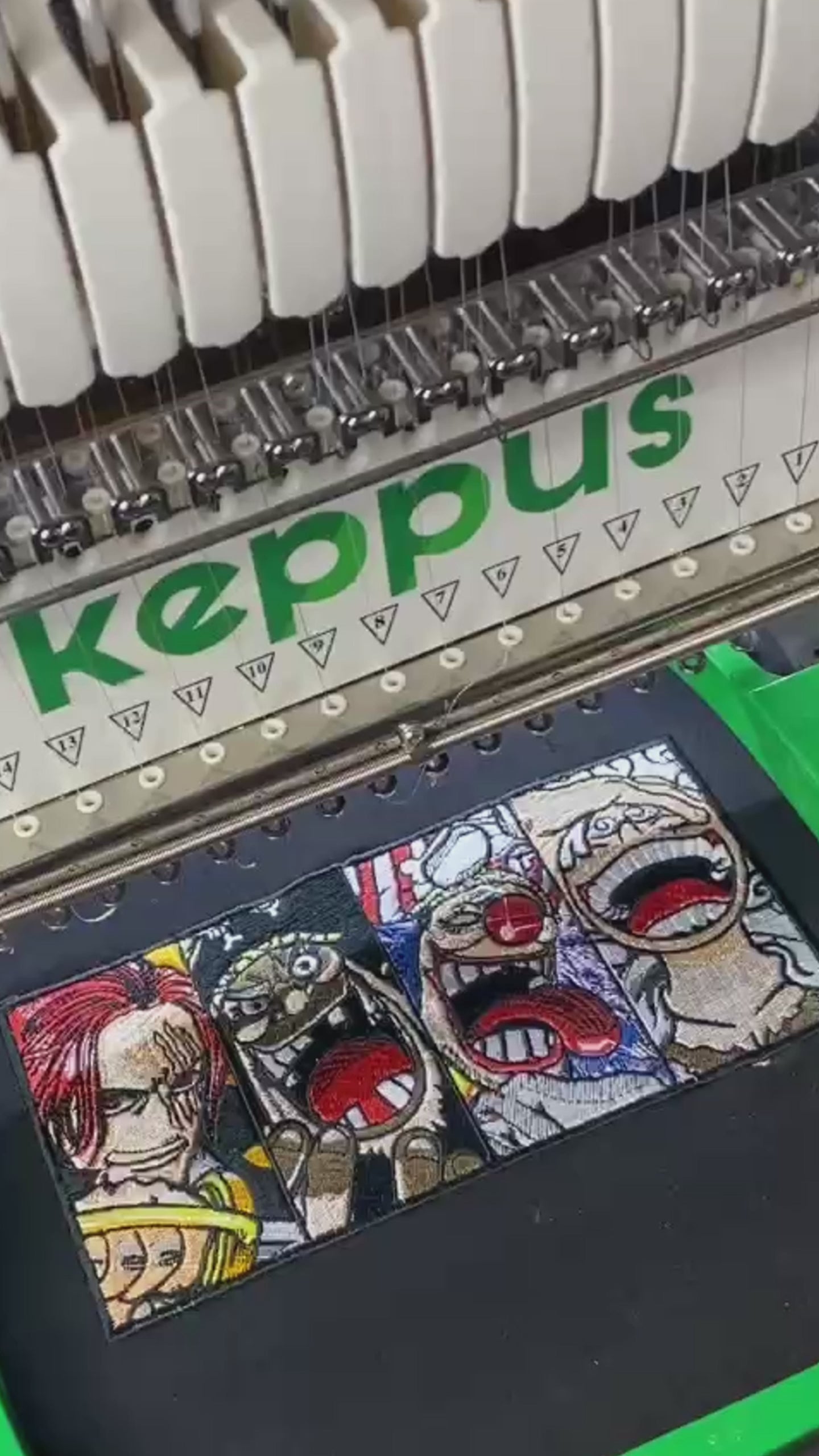 Close-up of embroidered One Piece emperor faces