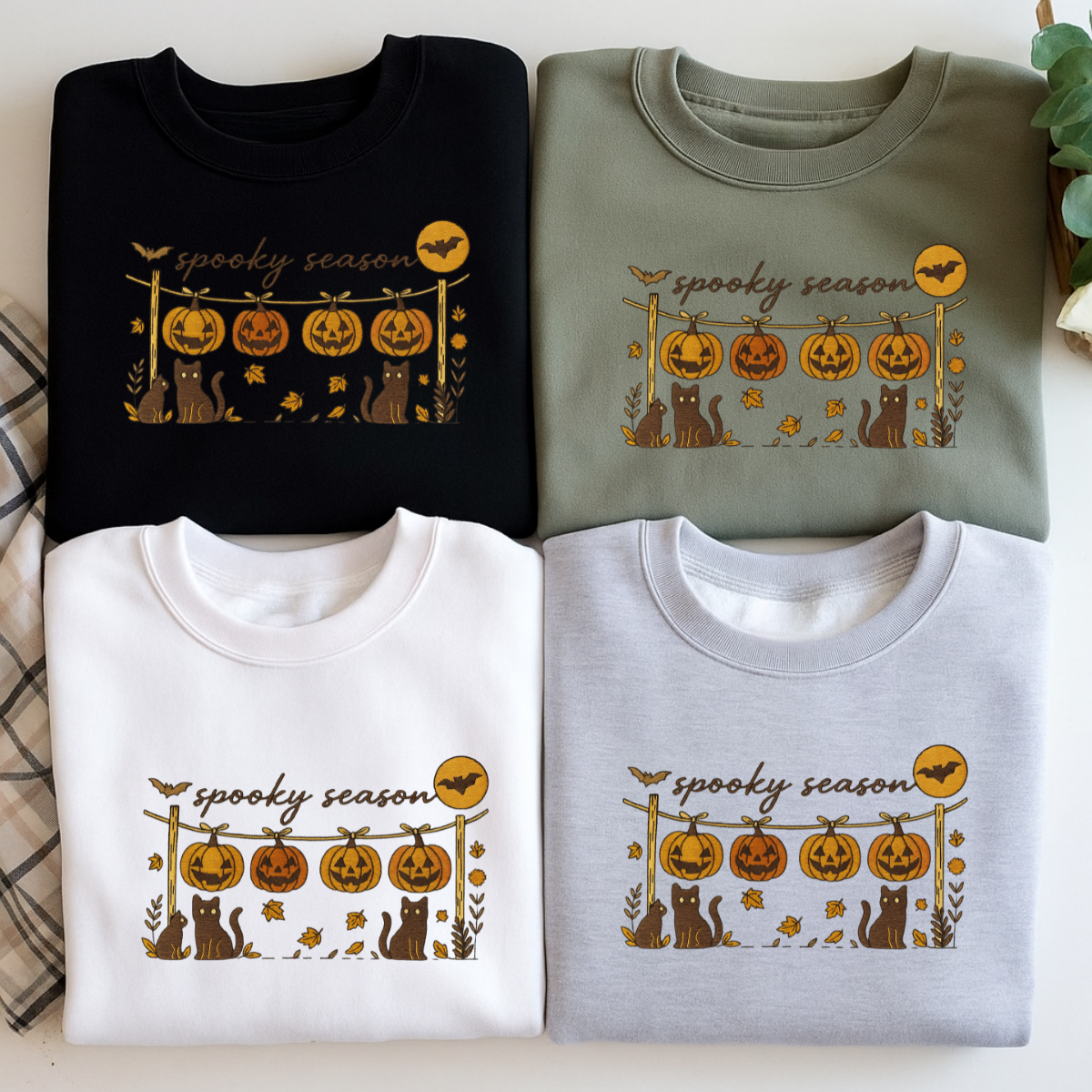 sand color spooky season embroidered sweatshirt folded
