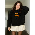 unisex pumpkin bow embroidered sweatshirt on model
