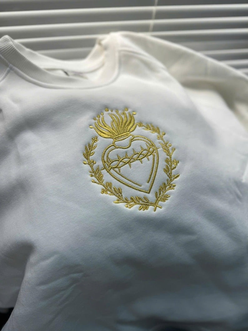 white unisex sweatshirt with catholic sacred heart